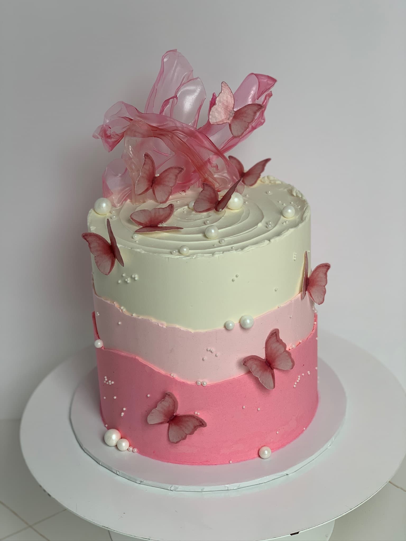 Pink ombre butterfly single tier cake