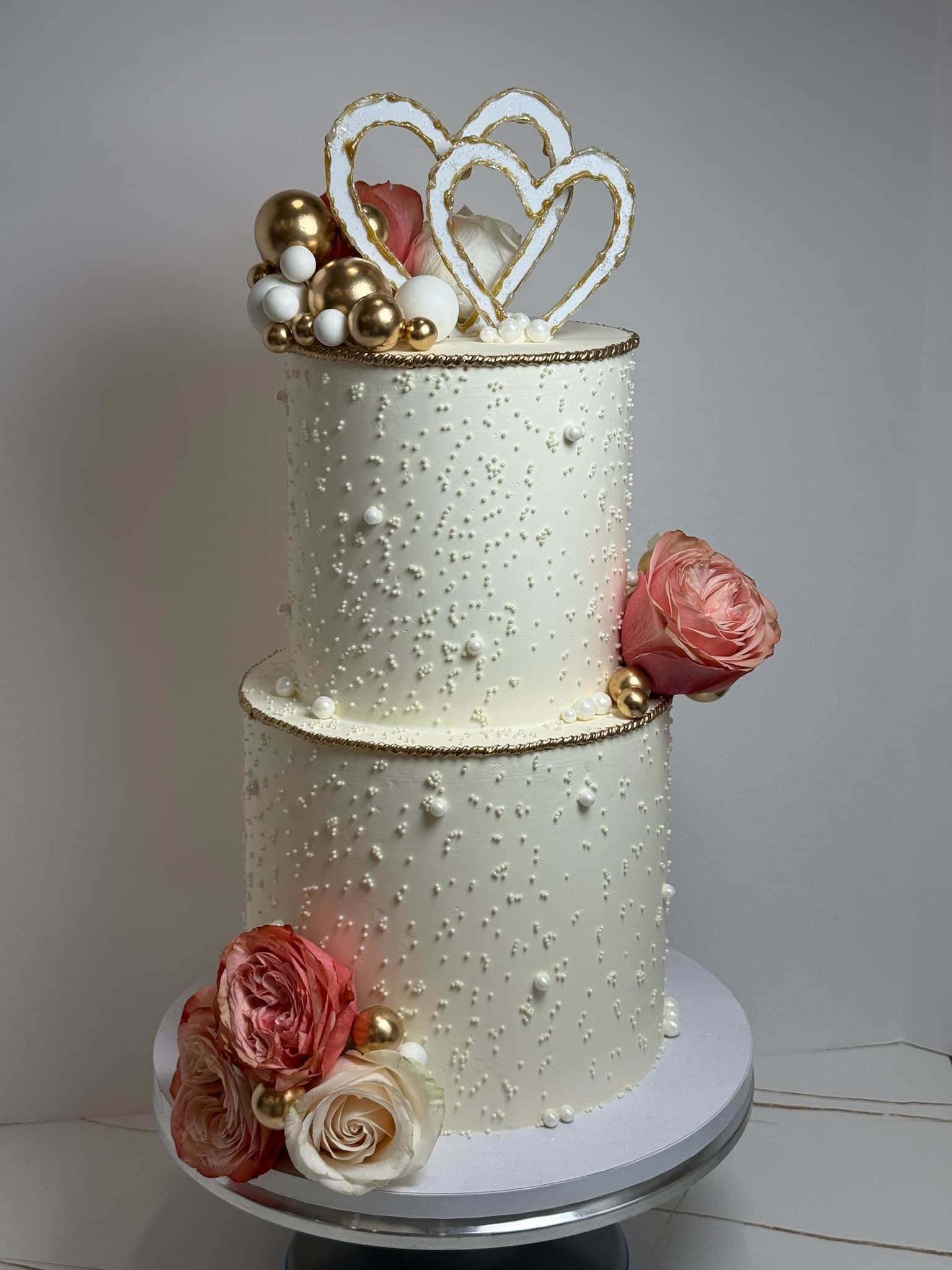 Pearl and gold hearts two-tier wedding cake