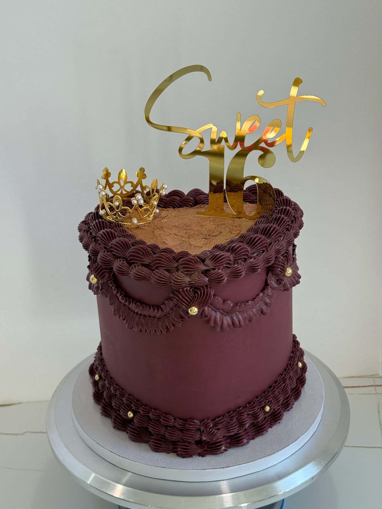 Sweet 16 burgundy birthday cake