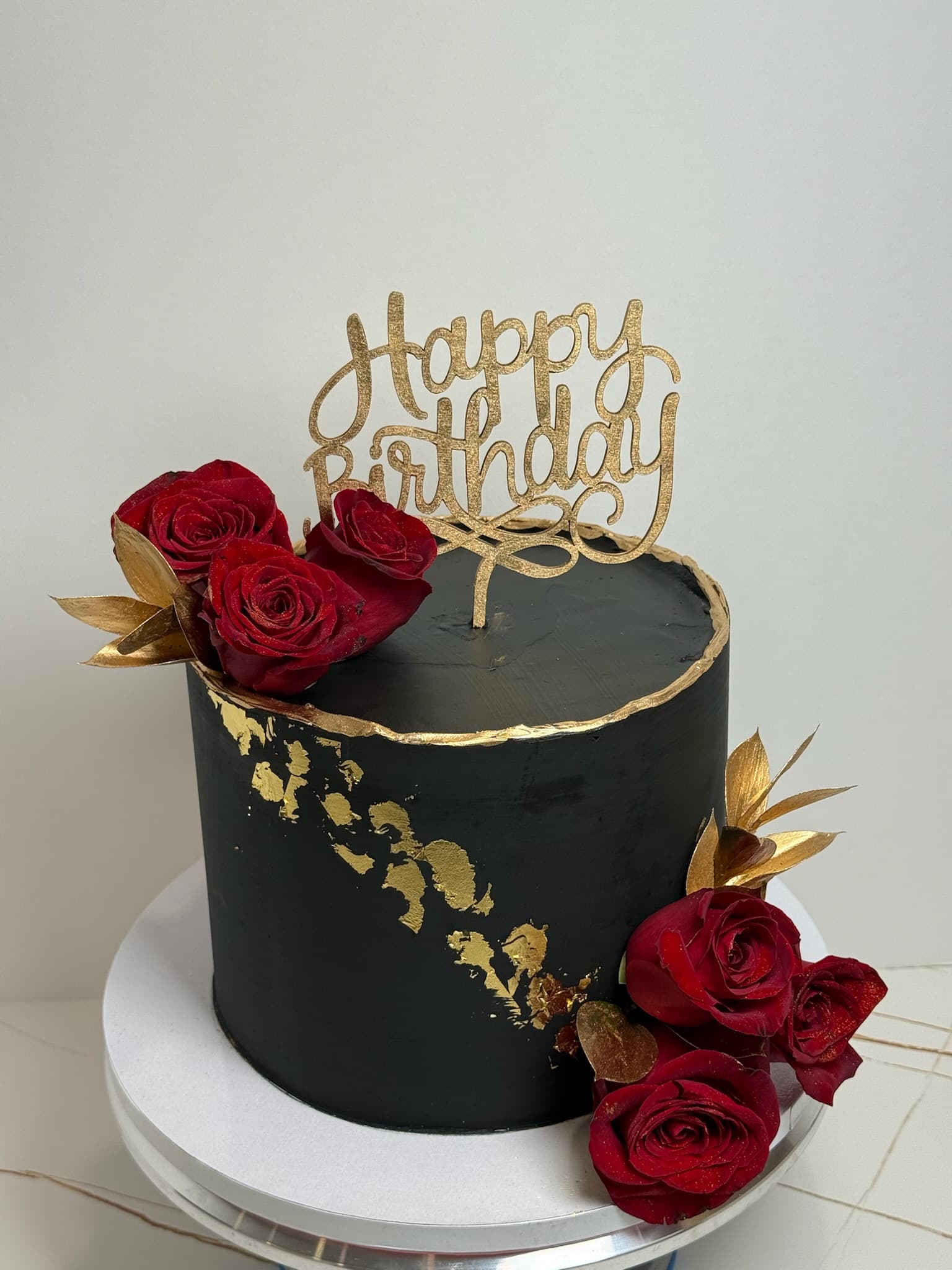 Black and red roses birthday cake