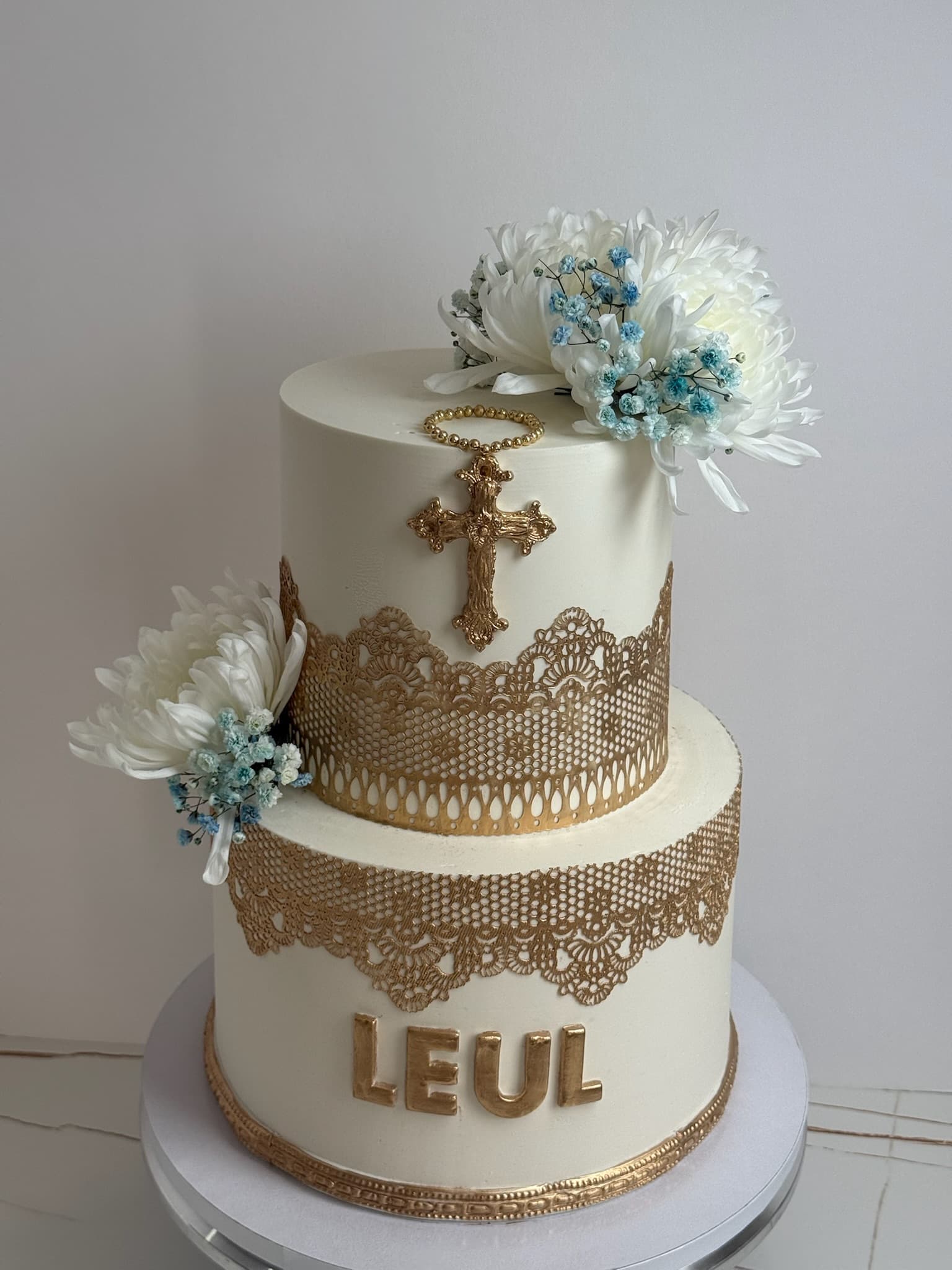 Gold lace christening two-tier cake