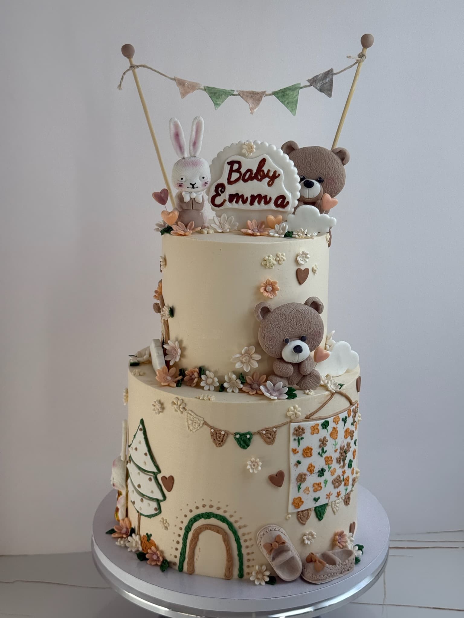 Baby Emma woodland two-tier baby shower cake