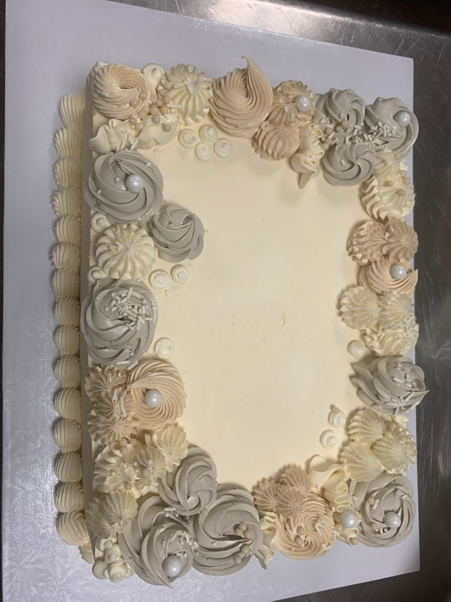 Elegant rosette border sheet cake