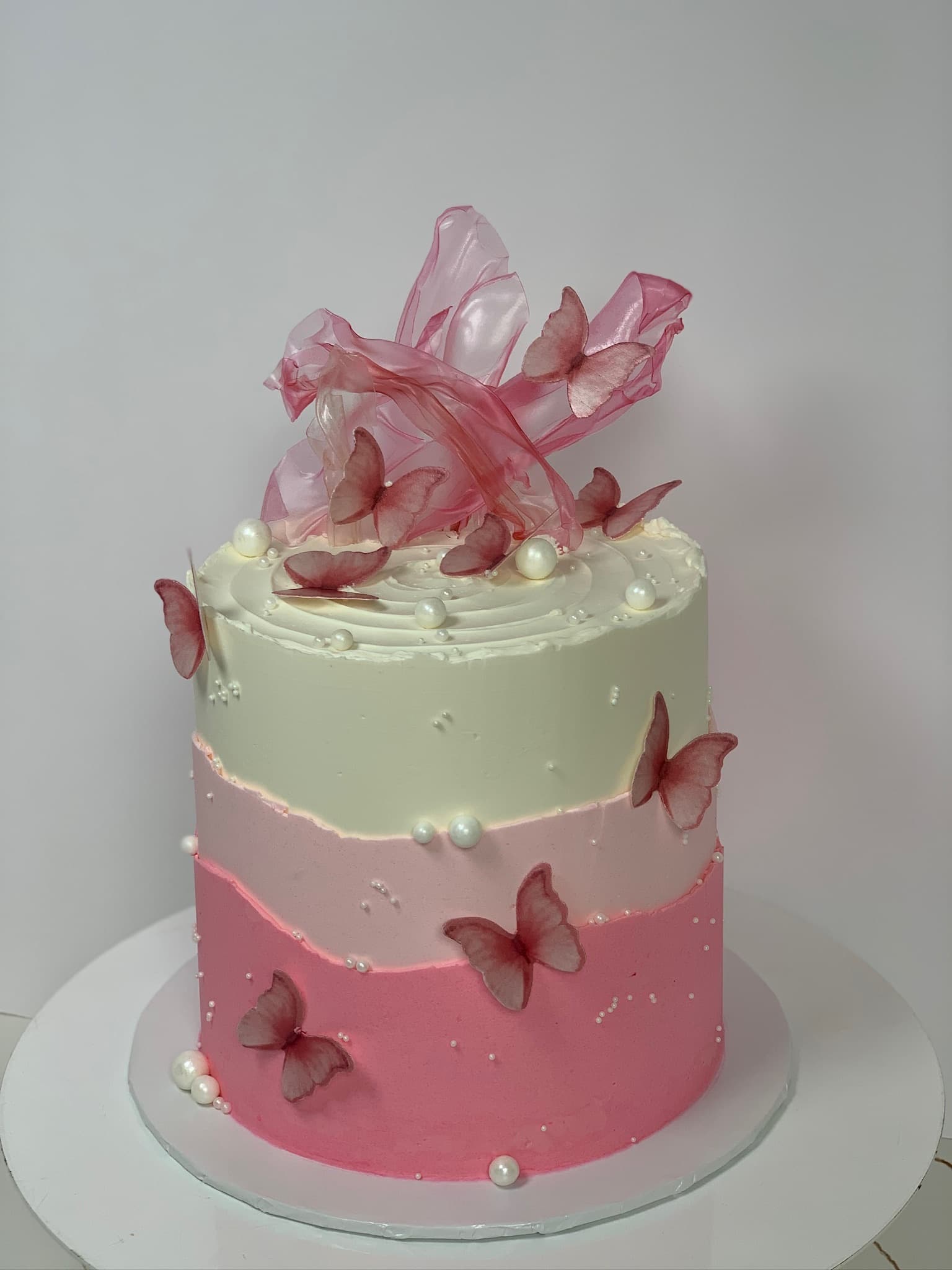 Pink ombre butterfly birthday cake